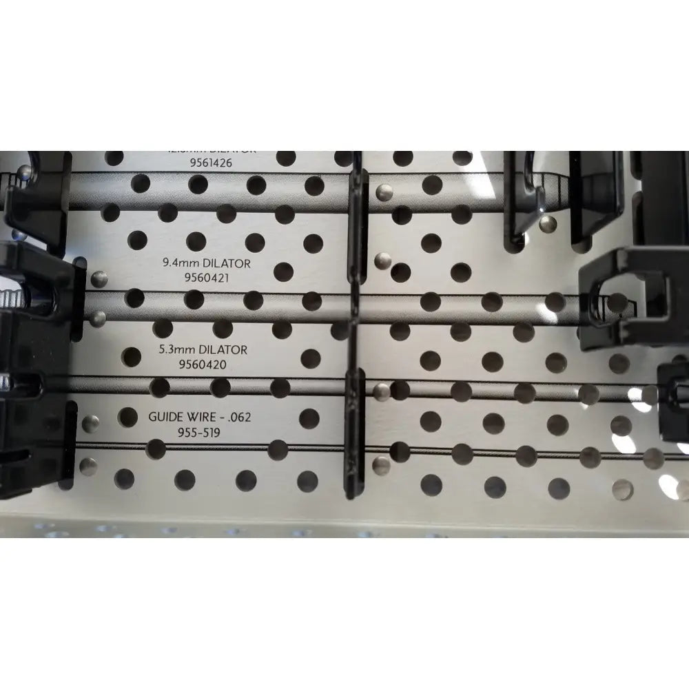 Metallic rigid dilators and guide wires organized in a black holder perforated reuse medical sterilization tray medtronic 9568529