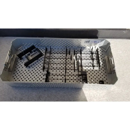 Stainless steel medtronic 9568529 metrx ii system dilators tray with perforated sides and organized sterilization compartments