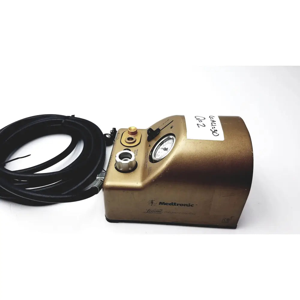 Gold-colored medtronic synnert portable oxygen concentrator with black hose and gauge for midas rex legend gold use