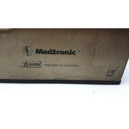 Medtronic a65535-07 midas rex legend gold pneumatic drill foot control unit box with brown cardboard surface and black branding