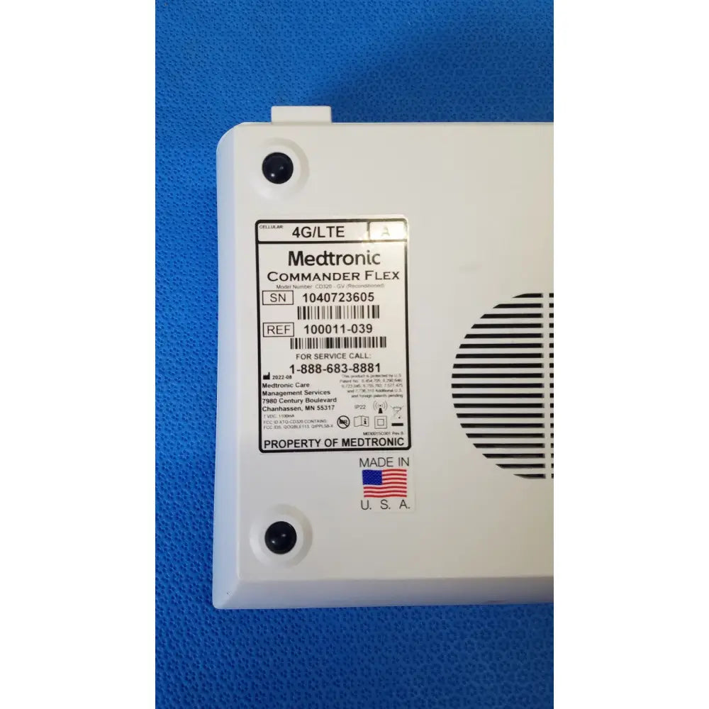White plastic medtronic commander flex 4g lte medical device back with vented panel and service label for patient monitoring