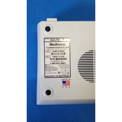 White plastic medtronic commander flex 4g lte medical device back with vented panel and service label for patient monitoring