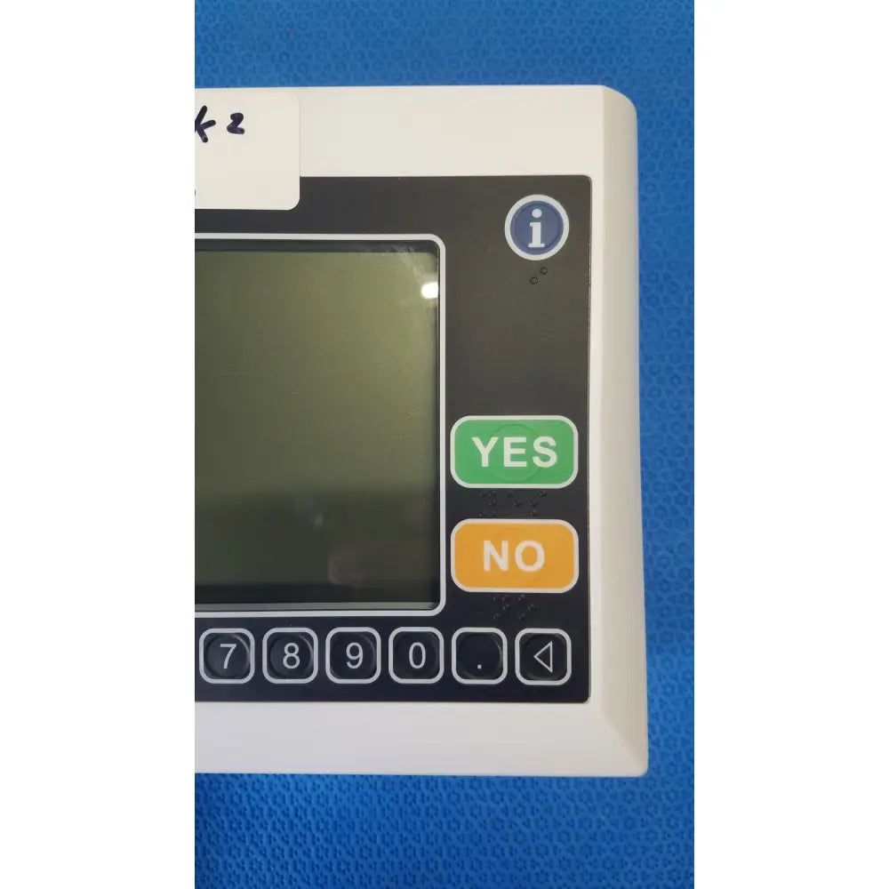White medical infusion pump with black control panel and yes no buttons for medtronic commander flex patient monitor