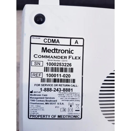 White medtronic commander flex cd315 cellular device with black label showing model and service info for reuse medical use