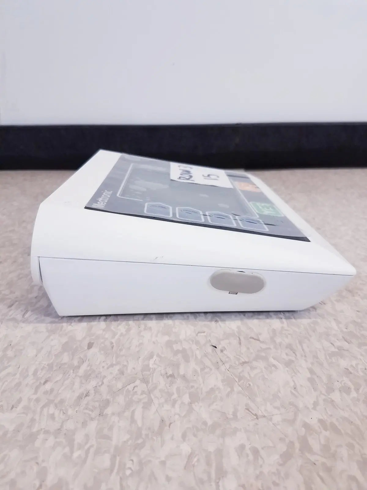 White plastic medtronic commander flex insulin pump with gray label and circular port for reuse medical use untested model cd315