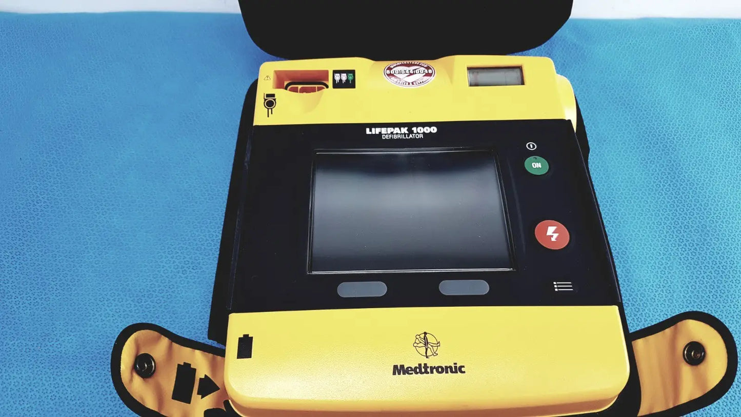 Reuse Medical Medtronic Lifepak 1000 Defibrillator w/ Case – Needs Battery & Quik-Pak Pads Defibrillators, AED Pads & Batteries, second-hand product photo 1