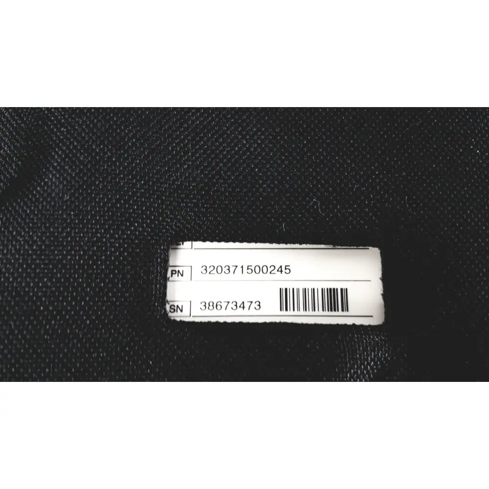 White rectangular label with black barcode and alphanumeric codes on back of medtronic lifepak 1000 defibrillator case for reuse medical quik-pak pads