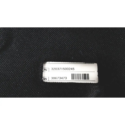 White rectangular label with black barcode and alphanumeric codes on back of medtronic lifepak 1000 defibrillator case for reuse medical quik-pak pads