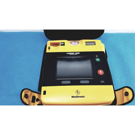 Reuse Medical Medtronic Lifepak 1000 Defibrillator w/ Case – Needs Battery & Quik-Pak Pads Defibrillators, AED Pads & Batteries, second-hand product photo 1