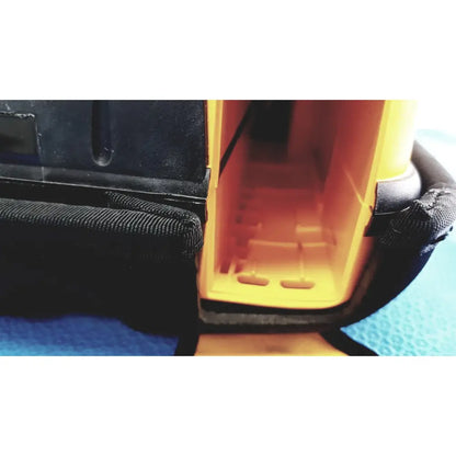 Medtronic lifepak 1000 defibrillator with black and orange plastic case featuring textured grip straps for reuse medical use with quik-pak pads