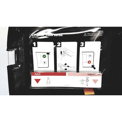 Black Medtronic Lifepak 1000 defibrillator with clear instructional card for adult and child use, needs battery and Quik-Pak pads