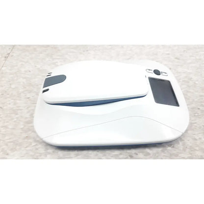 Medtronic mycarelink remote patient monitor model 24955 with sleek white and blue robotic vacuum cleaner design