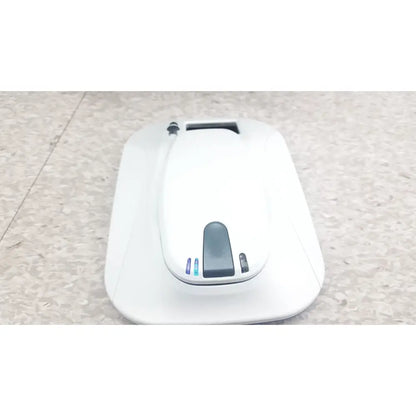White robotic vacuum cleaner with sleek design and blue indicator lights for medtronic mycarelink remote patient monitor use