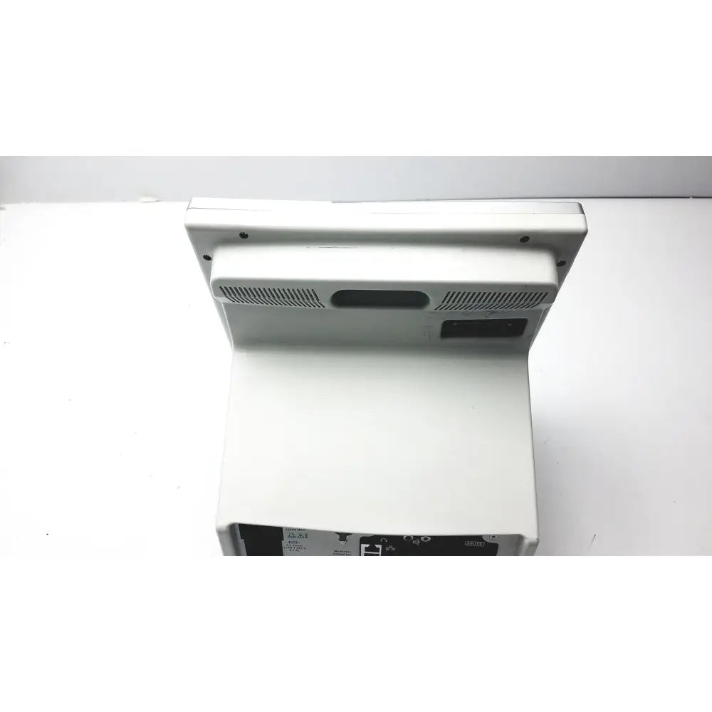 White plastic touchscreen cash register with ventilation slits on back panel medtronic nim-response reuse medical device