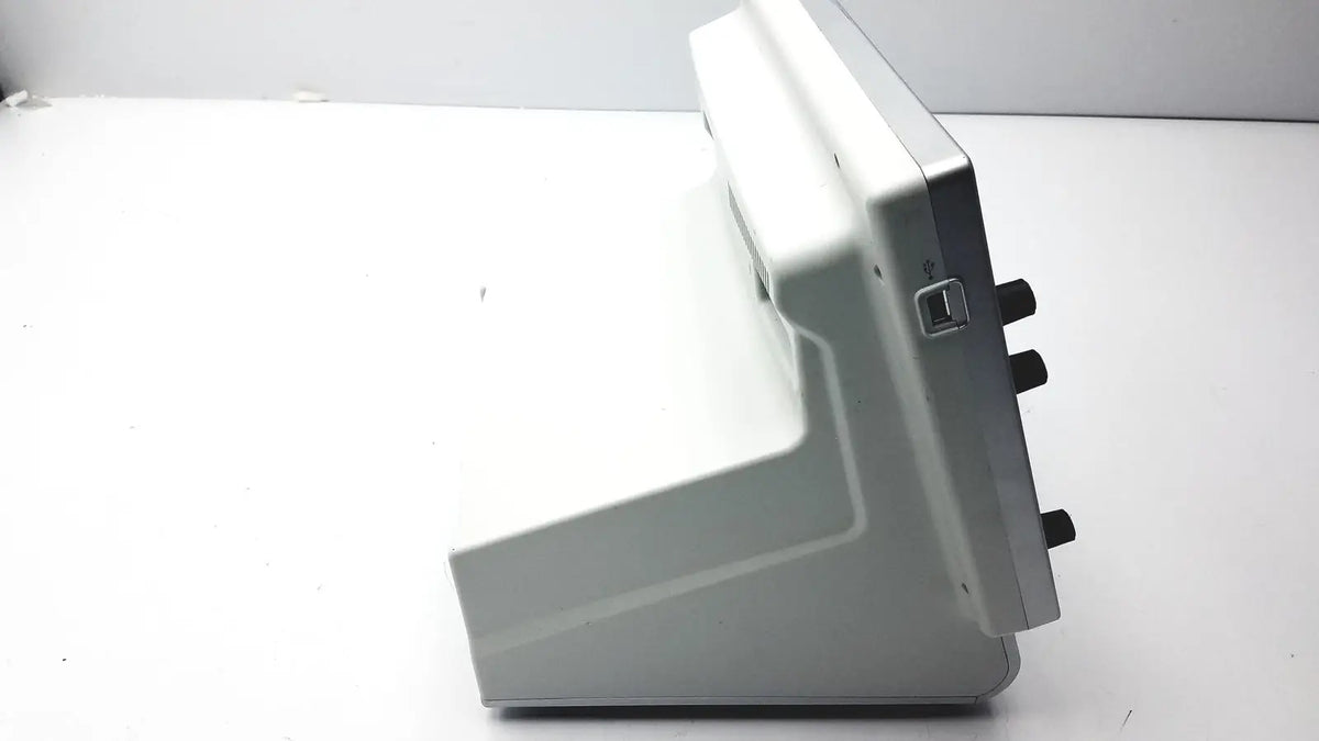 Gray plastic Medtronic nim-response 3.0 console with black knobs and USB port for reuse medical applications