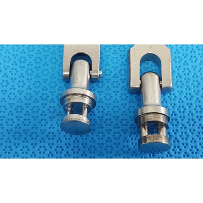 Silver-colored metal u-shaped medtronic octobase retractor handle with cylindrical shafts and threaded bases lot of 2