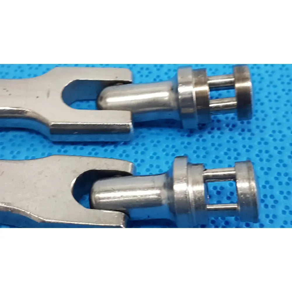 Silver-colored metal universal joint connectors with polished finish for medtronic octobase retractor handle lot of 2