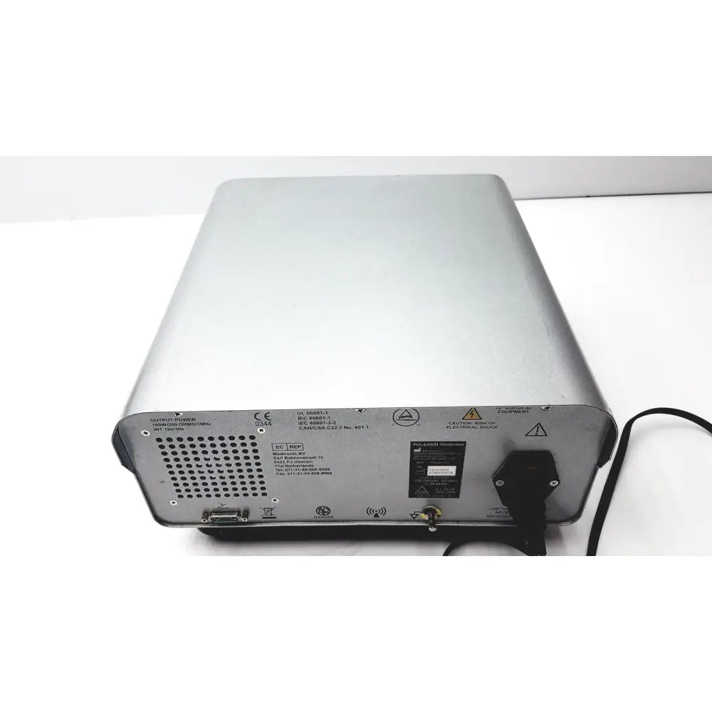 Silver metallic rectangular power supply unit with ventilation holes and certification marks medtronic peak plasmablade pulsar ii generator