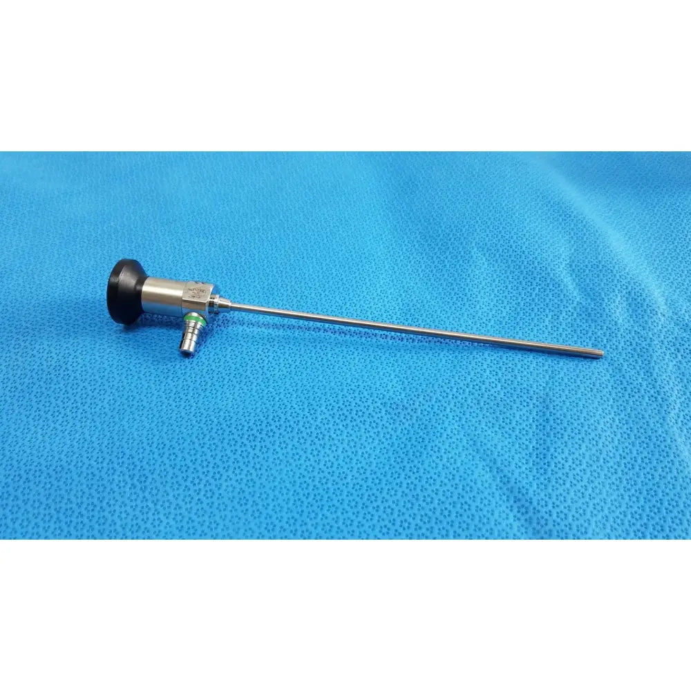 Silver medtronic sharpsite autoclavable 134°c endoscope with black handle and green-tipped connector for surgical use