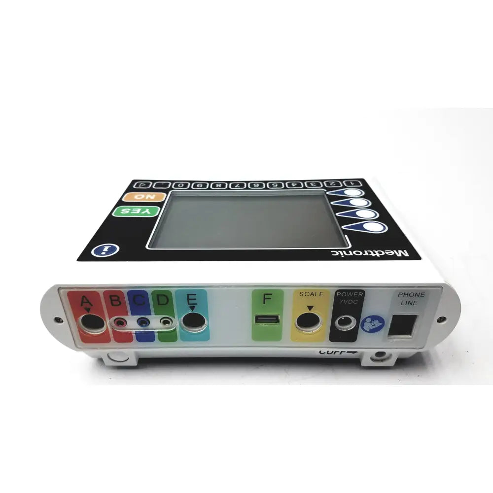 White medtronics commander flex medical infusion pump with black control panel and colorful labeled ports and buttons