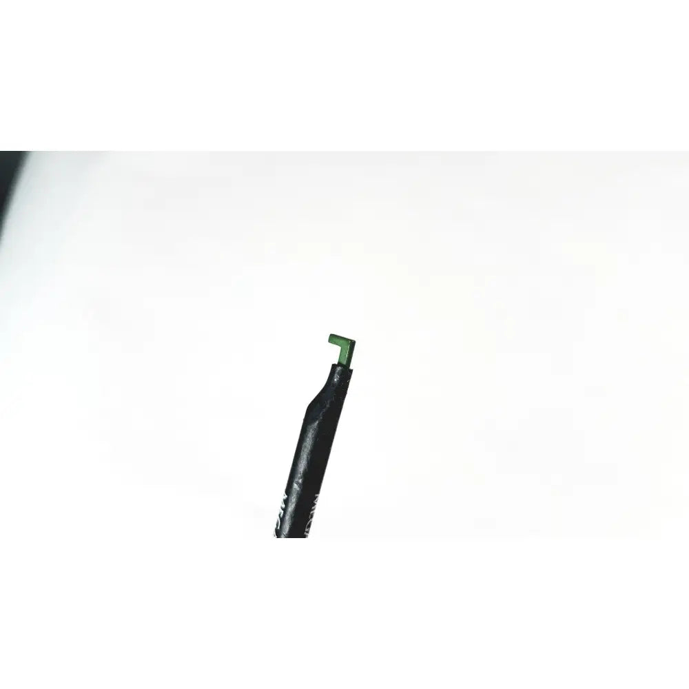 Black insulated laparoscopic electrosurgical probe with green metallic tip from megadyne e-z clean l-hook surgical tool