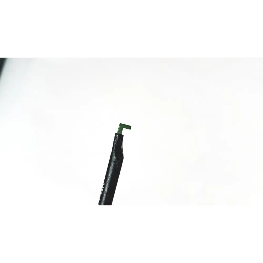 Black insulated wire with green plastic tip on megadyne e-z clean l-hook laparoscopic electrosurgical instrument