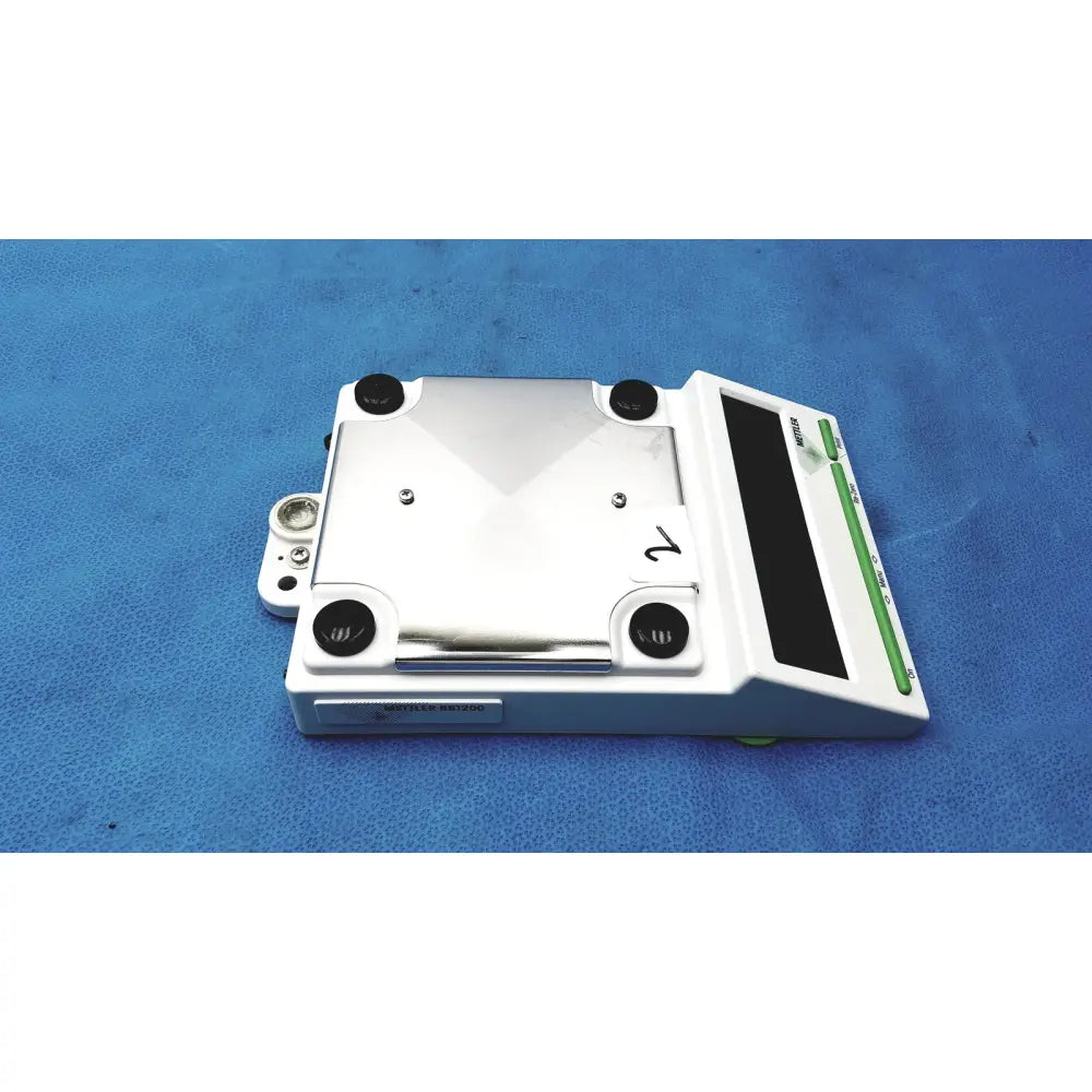 Mettler bb1200 digital scale white and silver with green accents on side panel for precise weighing tasks