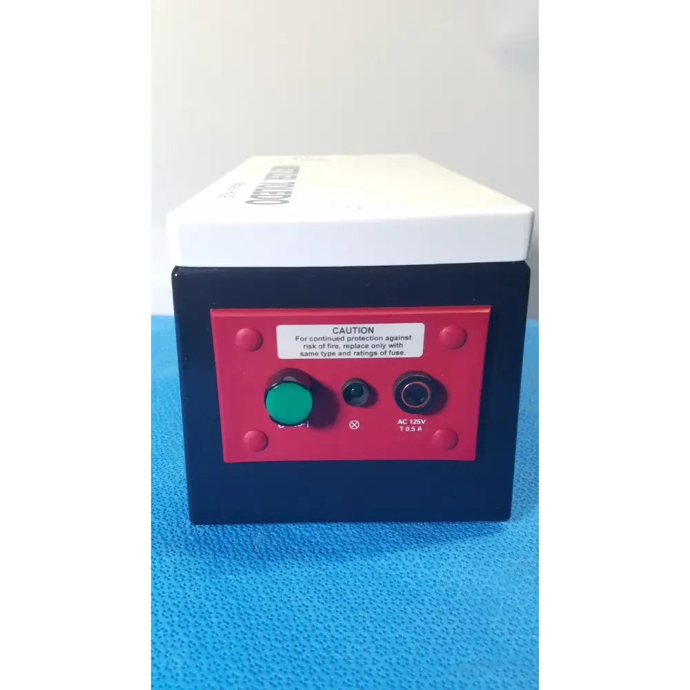 Black and red mettler toledo haug en 8 slc power supply circuit breaker box with green push-button and ac 125v 10.5a label