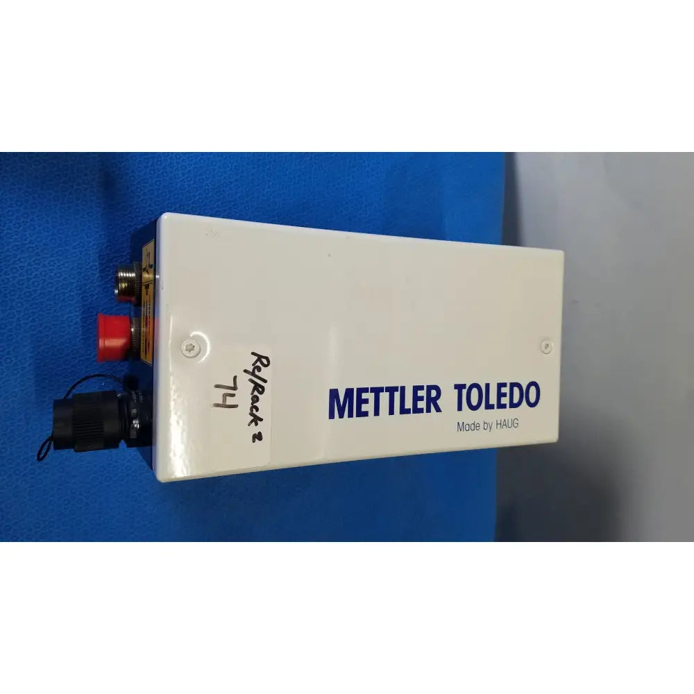White rectangular mettler toledo haug industrial weighing scale with blue branding and red button for slc power supply use