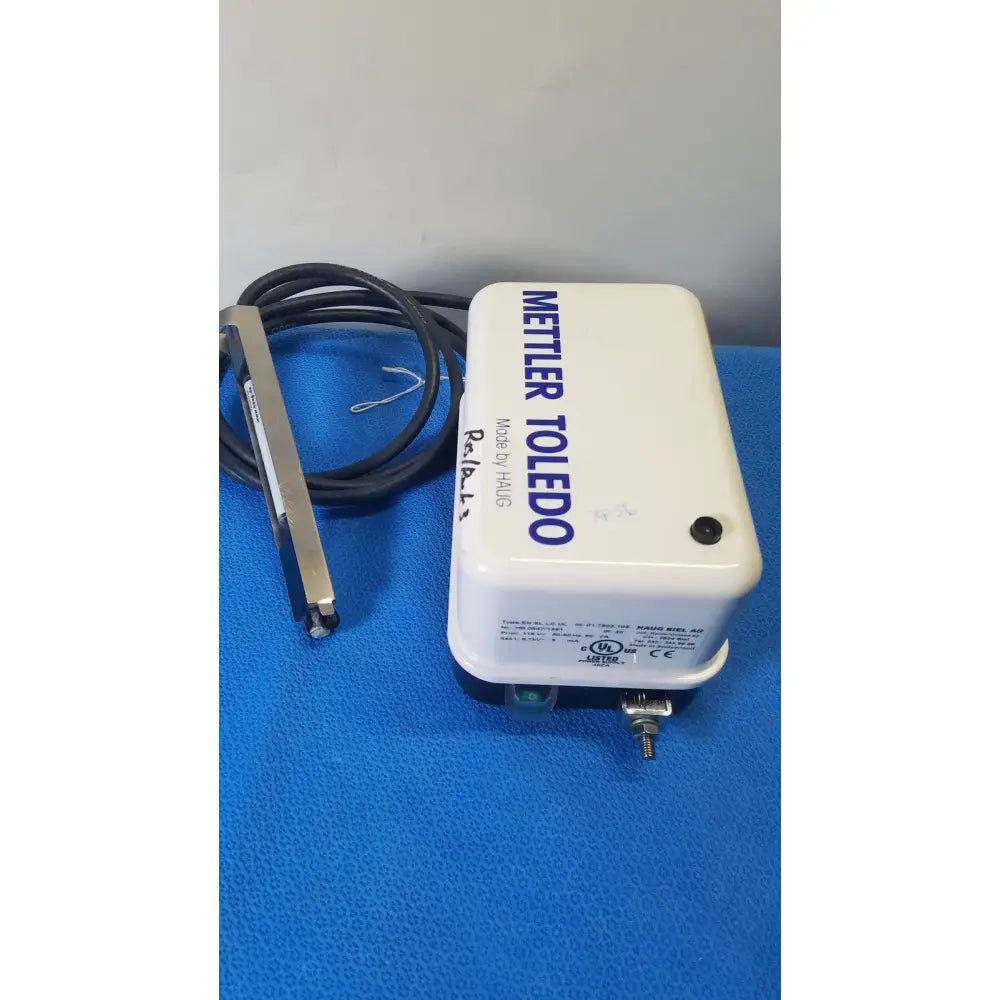 White rectangular mettler toledo haug static eliminator temperature controller with black coiled cable and metallic probe