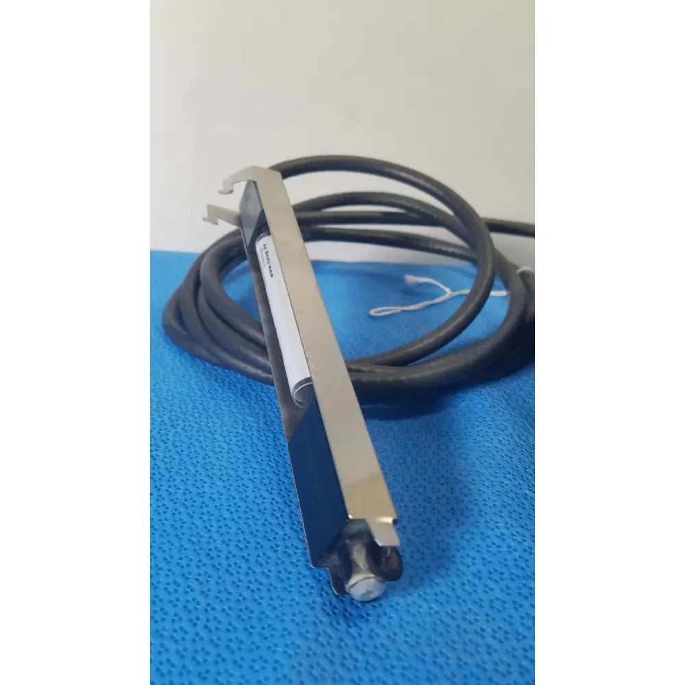 Silver metallic mettler toledo haug static eliminator bar system sensor with black coiled cable and white label