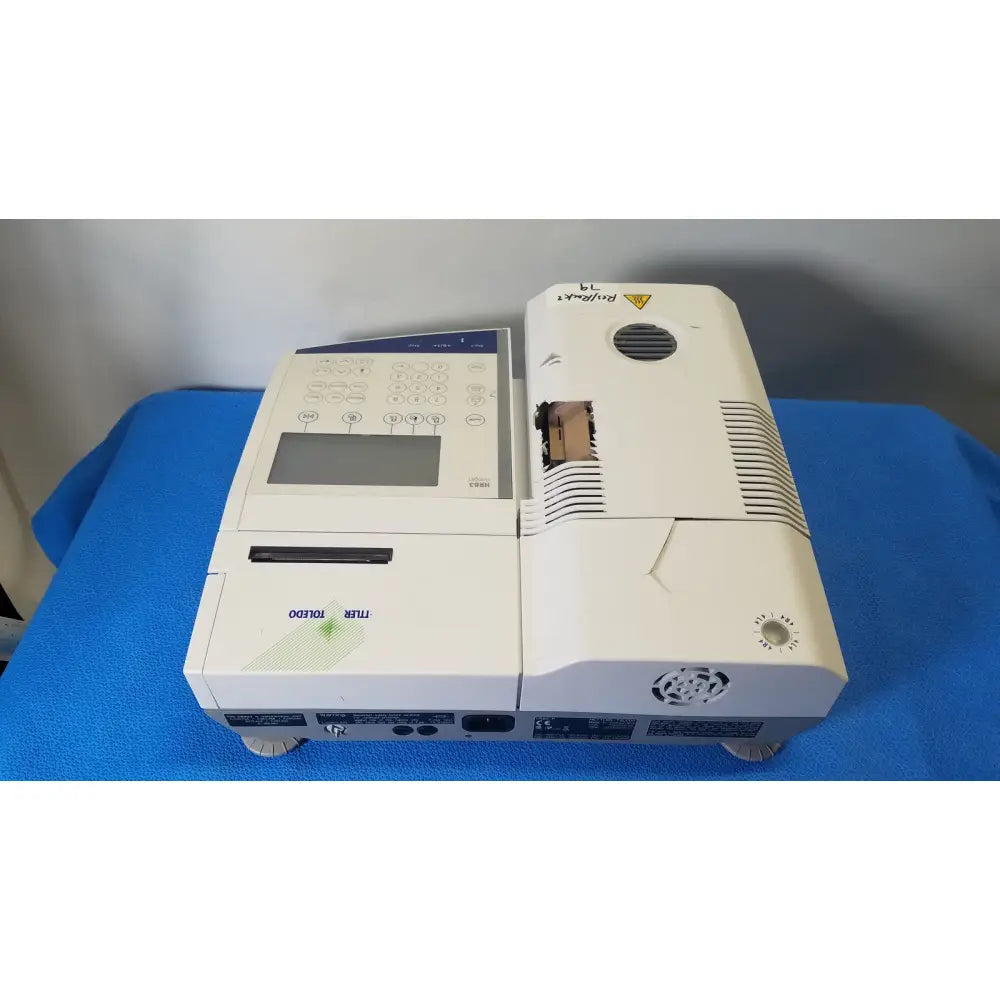 White rojahn 74 medical analyzer with control panel and ventilation slots for mettler toledo hr83-p halogen moisture analyzer