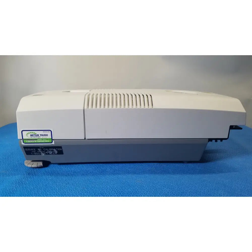 White and gray Mitutoyo 4-800 meter laser interferometer with vented top panel for Mettler Toledo hr83-p halogen moisture analyzer