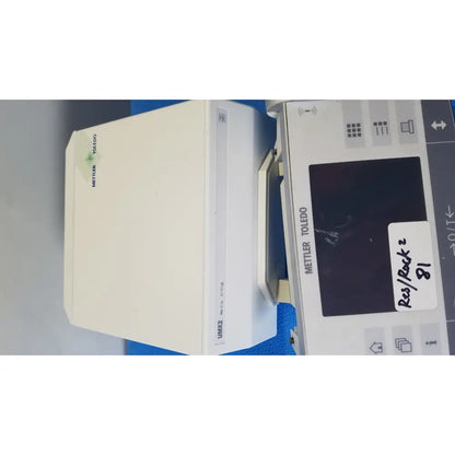 White mettler toledo umx2 medical infusion pump with digital display and control buttons for precise dosing