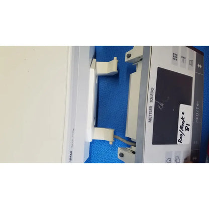 White plastic mettler toledo umx2 ultra-microbalance scale with digital display and control buttons