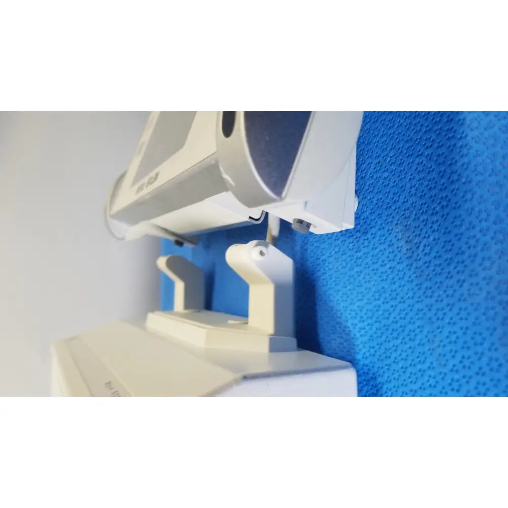 White medical eye examination machine with gray accents featuring a sleek design in mettler toledo umx2 ultra-microbalance scale