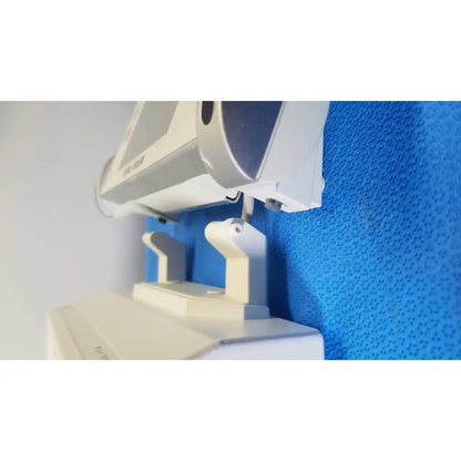 White medical eye examination machine with gray accents featuring a sleek design in mettler toledo umx2 ultra-microbalance scale