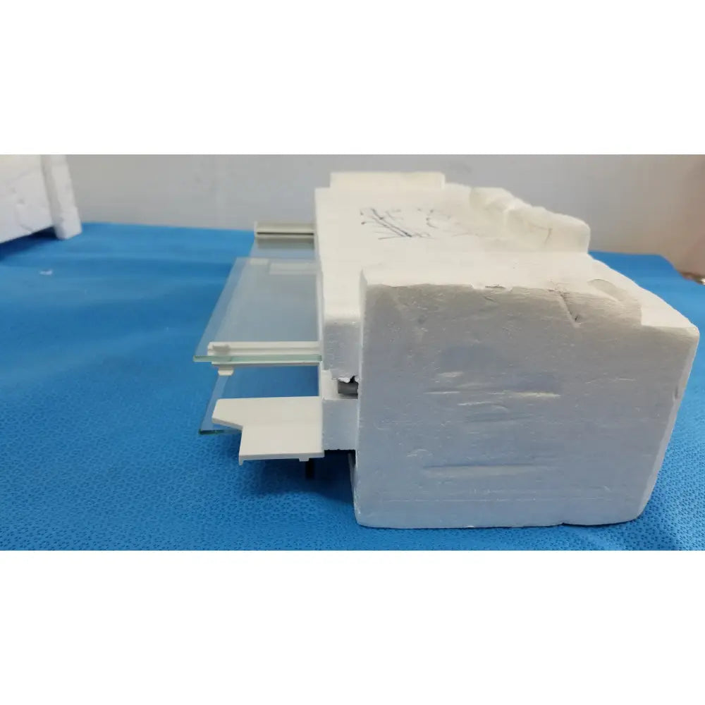 White foam architectural model of mettler toledo xp205 conducting glass draft shield with glass panels and metal accents