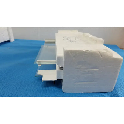 White foam architectural model of mettler toledo xp205 conducting glass draft shield with glass panels and metal accents