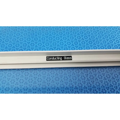 White mettler toledo XP205 conducting glass draft shield strip with black conducting glass label affixed to its surface