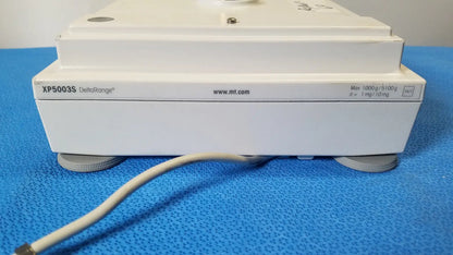 White rectangular laboratory balance mettler toledo xp5003sdr with specifications on side for toledo xp5003sdr communications module