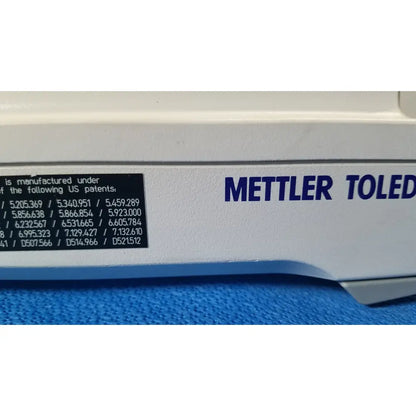 White mettler toledo analytical balance with blue lettering and black patent label for xp5003sdr communications module