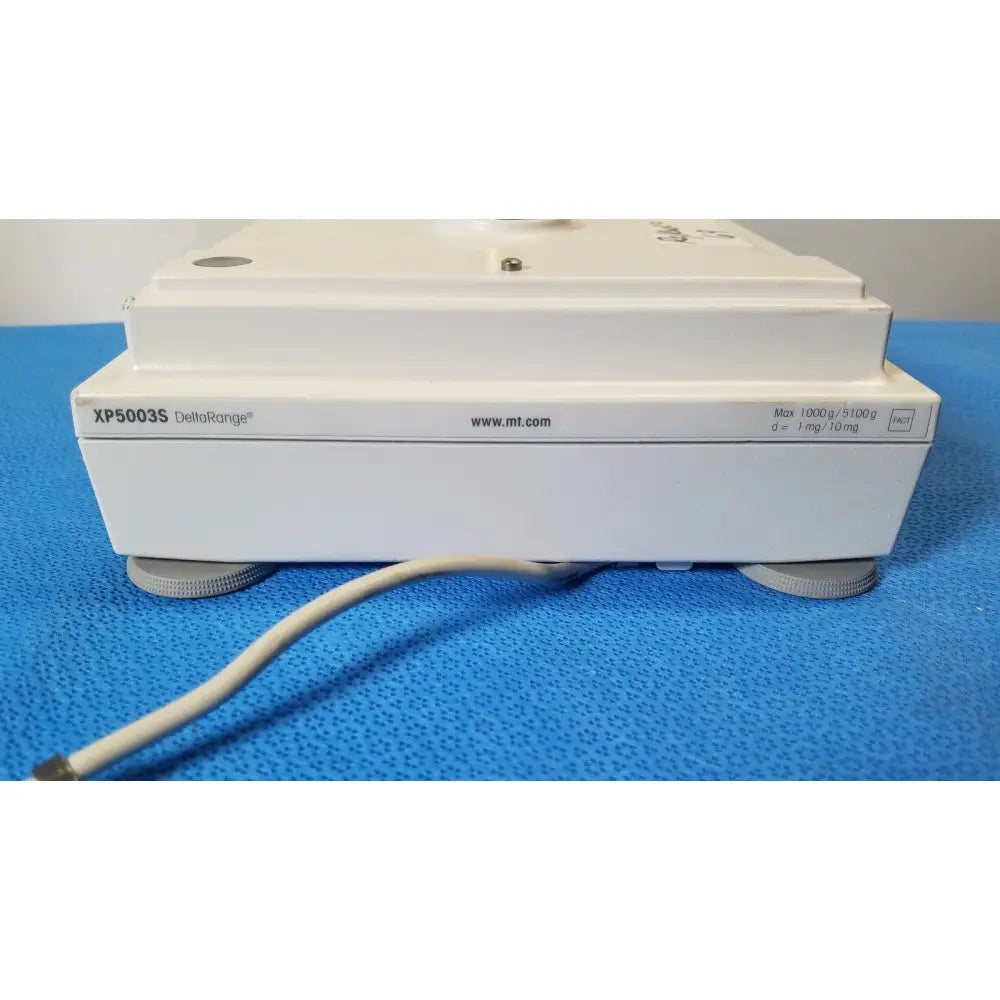 White rectangular laboratory balance mettler toledo xp5003sdr with specifications on side for toledo xp5003sdr communications module