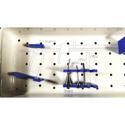 Blue plastic tray holding mhi instruments minilap uterine manipulator surgical instruments for chromotubation procedures