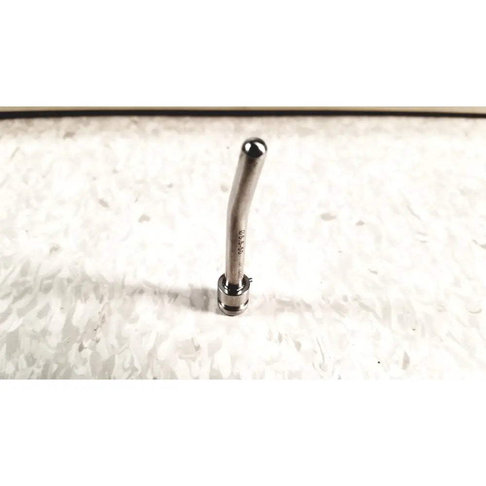 A sleek metallic mhi instruments minilap uterine manipulator with curved shaft and rounded tip for chromotubation use