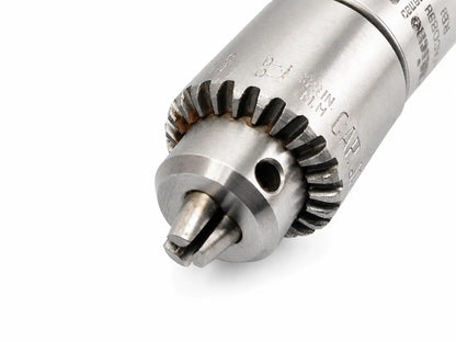 Silver metallic jacobs driver chuck with gear-like collar and engraved specifications in microaire 6680 driver chuck module