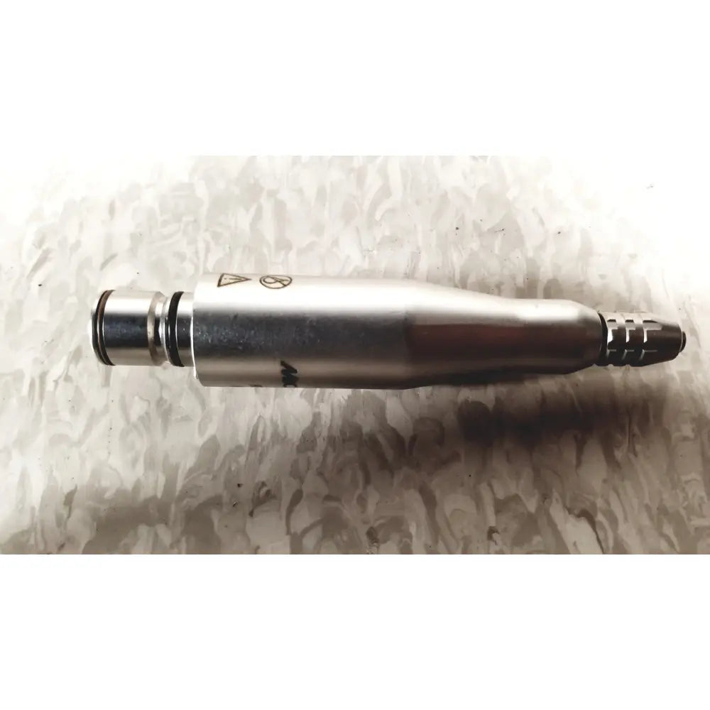 Silver metallic dental handpiece with textured grip and black rubber end cap for microaire surgical instruments case