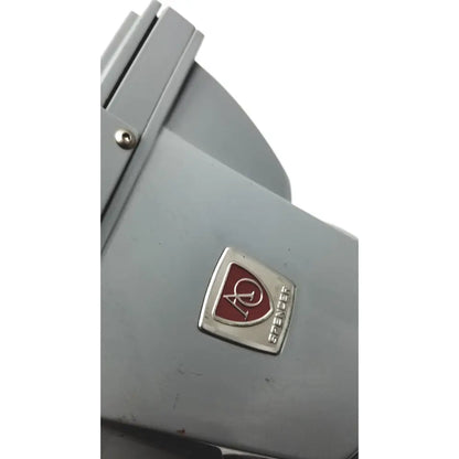 Gray metal american optical spencer microscope with red and silver emblem for precise scientific use