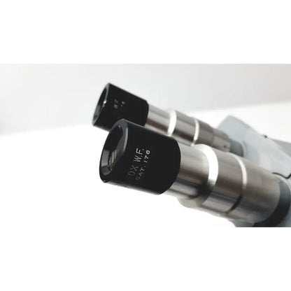 Black and silver microscope american optical spencer eyepieces with engraved markings for precision use