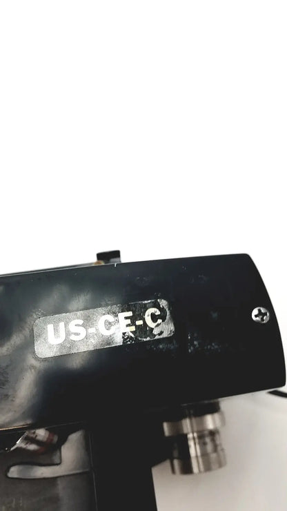 Microscope American Optical Spencer US-CE-C black with metallic objective lens and label on its body